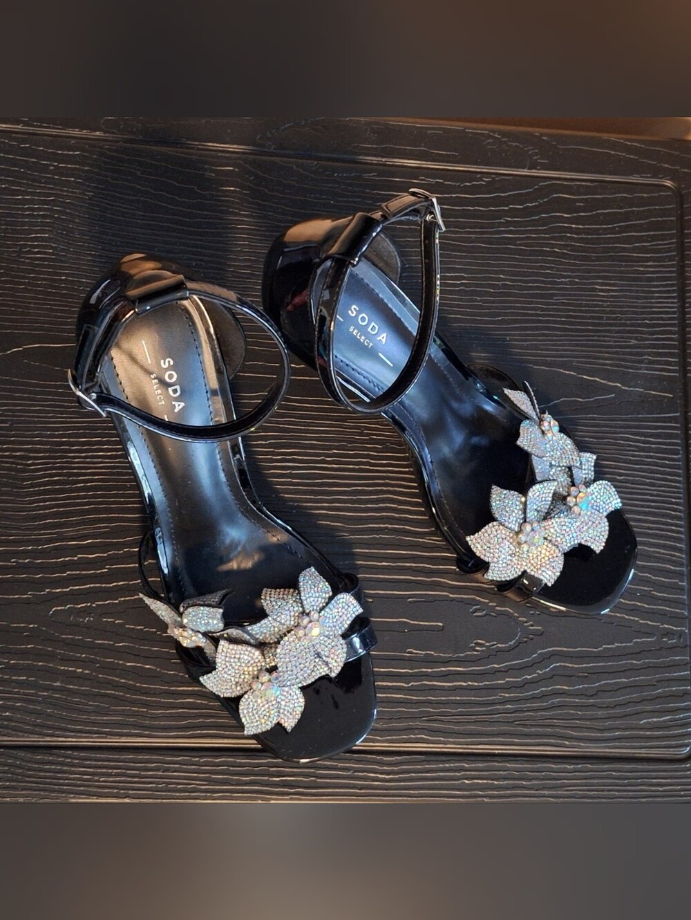 Soda Black Patent Ankle-Strap Heels with Crystal Flower Accents